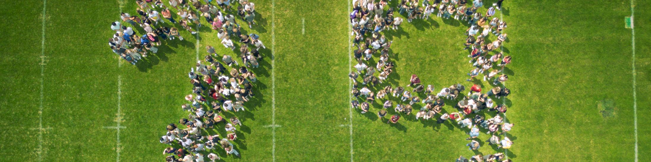 Photo of the class of 2029 on the football field.
